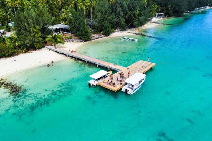 a pool next to a body of water